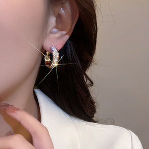 Small and shiny hoop earrings